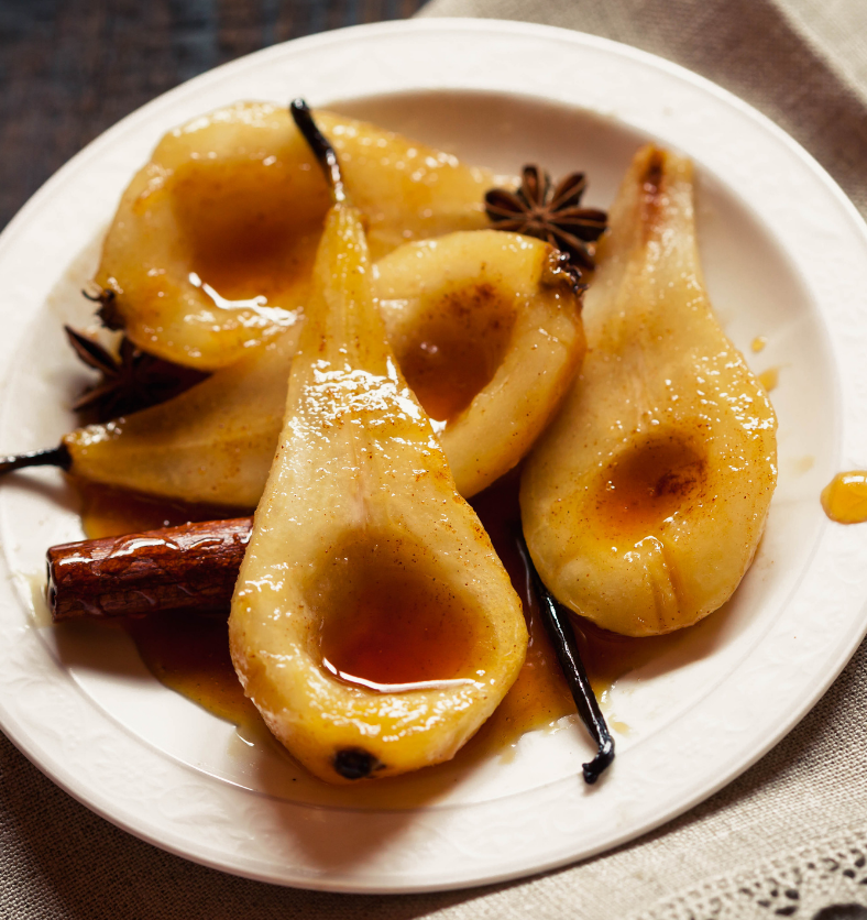 Pears drizzled in syrup as a visual representation of Autumn Pear Fragrance Oil available at Village Craft and Candle || Poires arrosées de sirop comme représentation visuelle de l'huile parfumée de poire d'automne disponible chez Village Craft and Candle