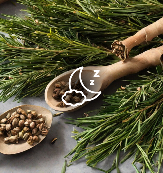 Romarin et cardamome sur un comptoir en marbre avec une lune et des nuages en relief comme représentation visuelle de l'huile parfumée Cypress & Cardamom EmotiScents (relaxante) disponible chez Village Craft and Candle