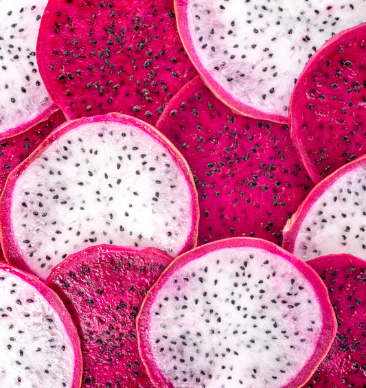 Sliced and layered dragonfruit as a visual representation of Dragonfruit Burst Fragrance Oil available at Village Craft and Candle