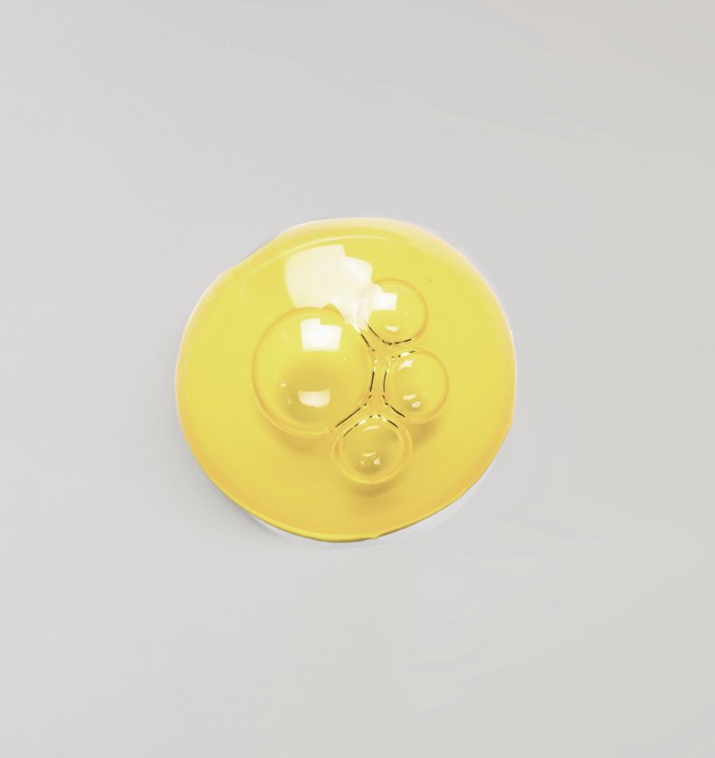 Pool of Polysorbate 20 with small bubbles on a light background. || Flaque de Polysorbate 20 avec de petites bulles sur un fond clair.
