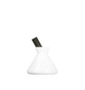 Image of a white glossy beaker style diffuser bottle with a thick fiber diffuser reed to represent Village Craft & Candle's 9oz Allure Diffuser Bottle || Image d'un flacon diffuseur de style bécher blanc brillant avec un bâtonnet diffuseur en fibre épaisse pour représenter le flacon diffuseur Allure de 9 oz de Village Craft & Candle