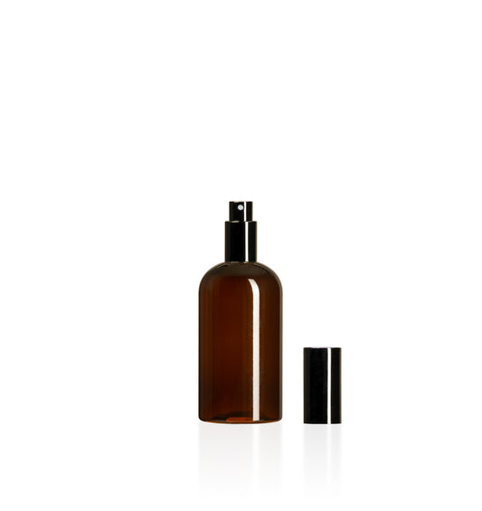 Image of a plastic amber bottle with a black lid on a white background to represent Village Craft & Candle's 7oz Boston Round bottles 