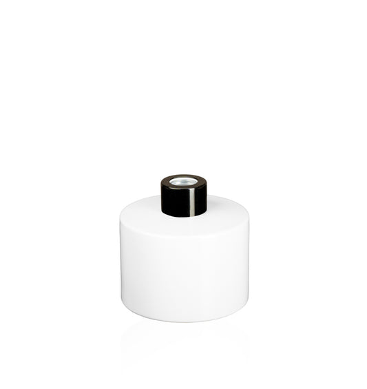 Image of a stout white glass diffuser bottle with a black collar on a white background to represent Village Craft & Candle's Lavish Diffuser Bottle. 