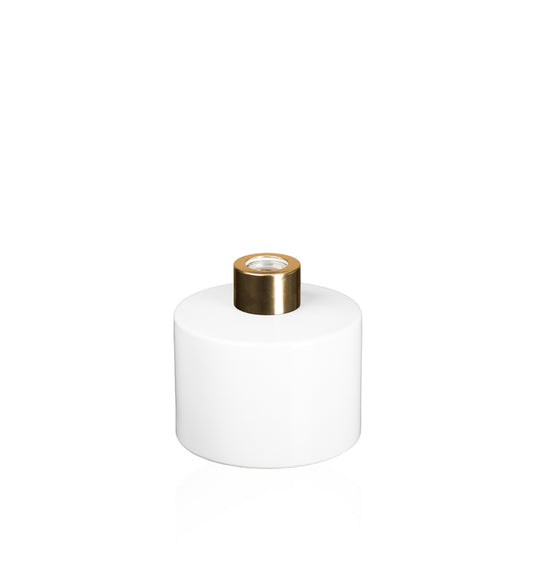 Image of a stout white glass diffuser bottle with a gold collar on a white background to represent Village Craft & Candle's Lavish Diffuser Bottle. 