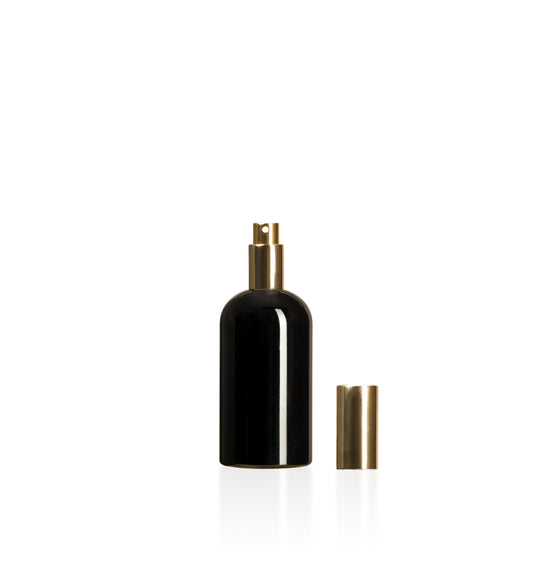 Image of a plastic black bottle with a gold lid on a white background to represent Village Craft & Candle's 7oz Boston Round bottles 