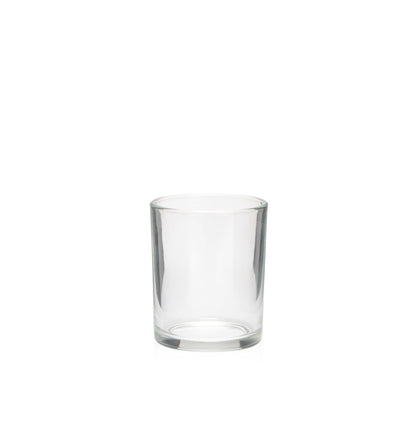 Image of a clear glass vessel on a white background to represent the Village Craft & Candle 4oz clear LUX jar. || Image d'un récipient en verre transparent sur un fond blanc représentant le pot LUX transparent de 4 oz de Village Craft & Candle