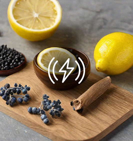 Lemon, cinnamon, and blueberries on a wood cutting board with an embossed lightning bolt as a visual representation of Agar Wood EmotiScents (Energy) Fragrance Oil available at Village Craft and Candle 