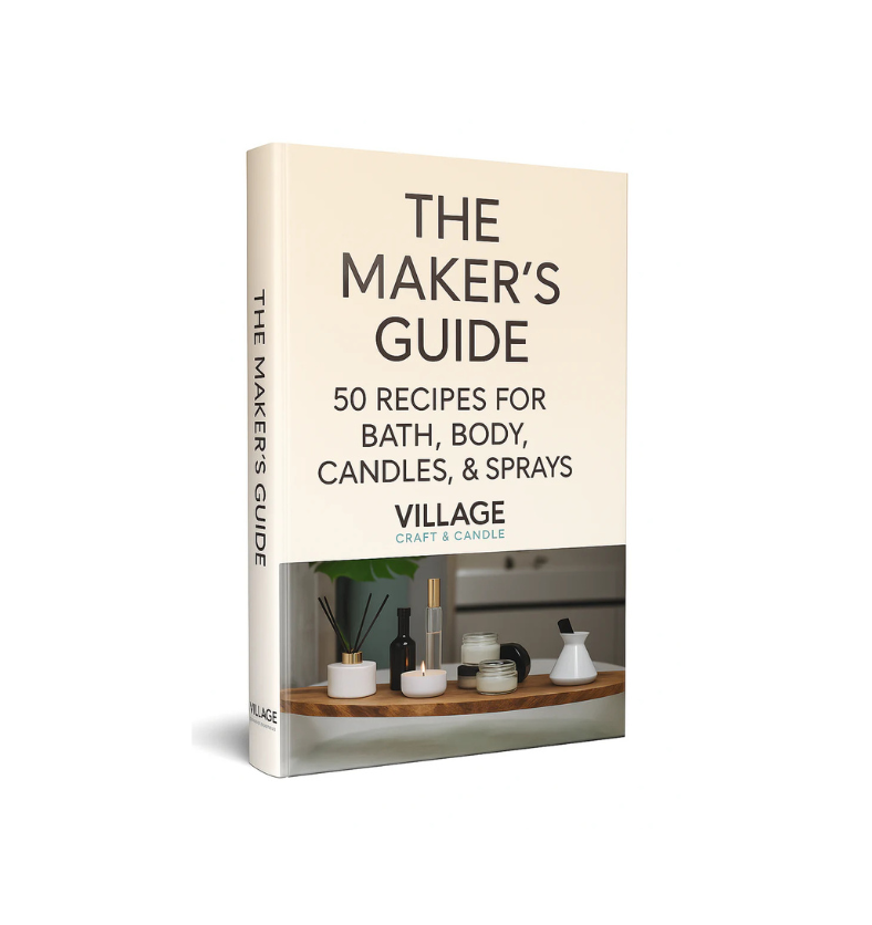 The Maker's Guide book, showing the cover with the title, "50 Recipes for Bath, Body, Candles, & Sprays," and the Village Craft & Candle logo. || Le livre The Maker's Guide (Le Guide du Créateur), montrant la couverture avec le titre, « 50 recettes pour le bain, le corps, les chandelles et les vaporisateurs », et le logo Village Craft & Candle.