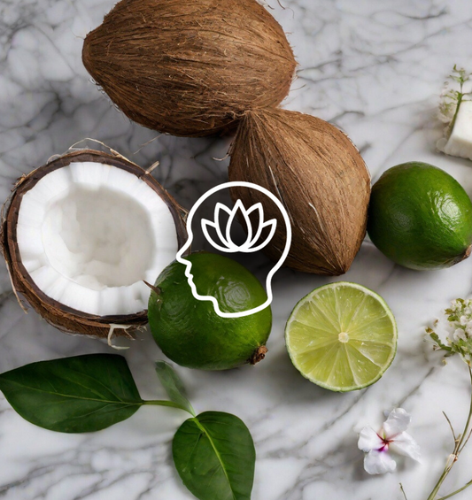  Noix de coco et citrons verts sur un comptoir en granit avec un graphique de pleine conscience comme représentation visuelle de l'huile parfumée Verveine Coco-Lime EmotiScents (Bien-être) disponible chez Village Craft and Candle