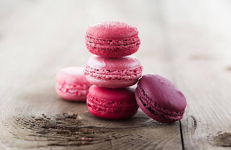 Pink Macaroons stacked on top of one another as a visual representation of Pink Macaroon Fragrance Oil available at Village Craft and Candle || Macarons roses empilés les uns sur les autres comme représentation visuelle de l'huile parfumée de macaron rose disponible chez Village Craft and Candle.