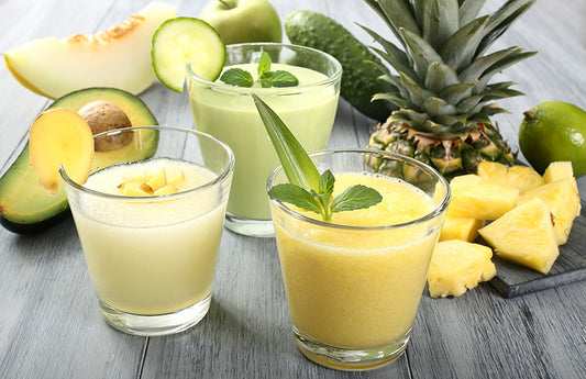 Collection of fruit and avocado smoothies with a variety of garnishes as a visual representation of Cucumber Melon Fragrance Oil available at Village Craft and Candle 